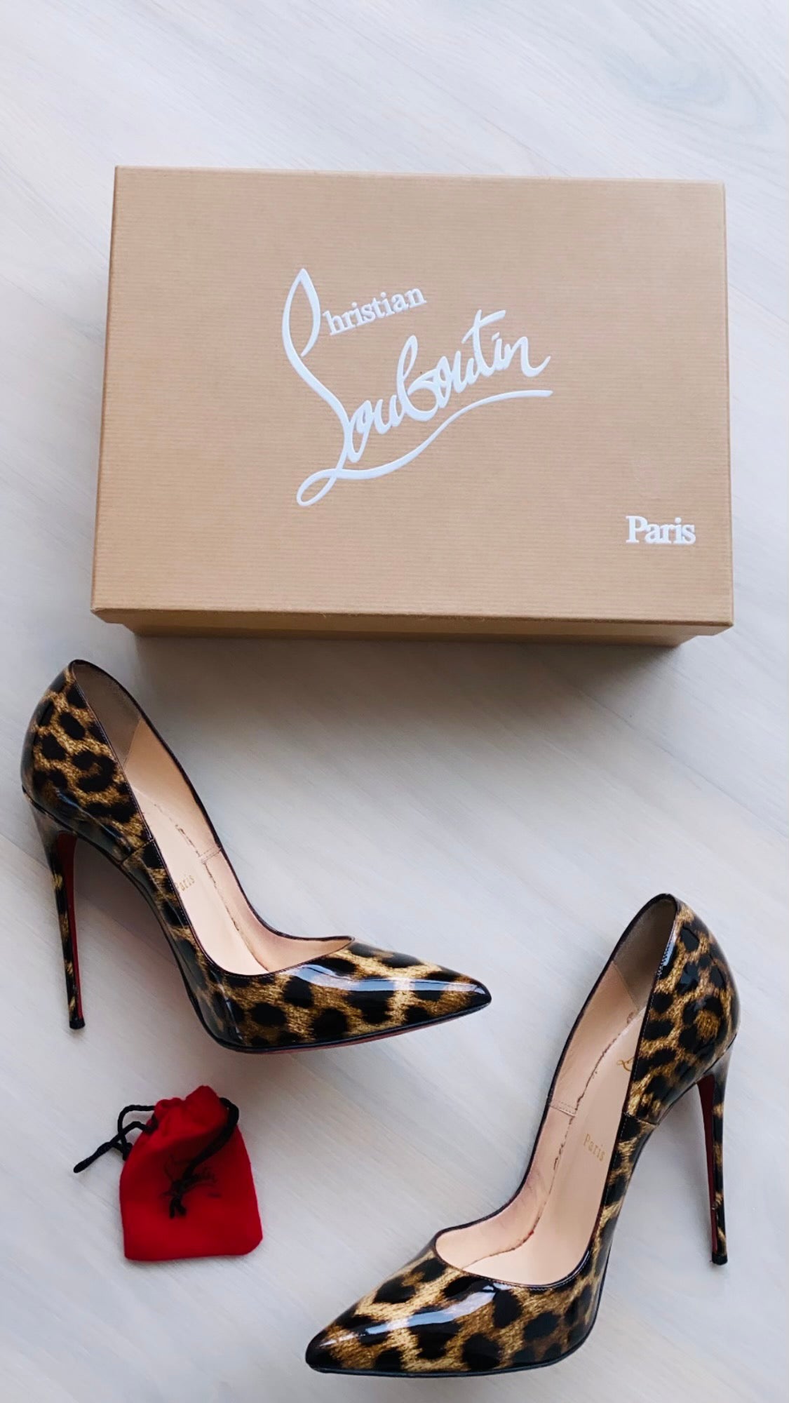 christian louboutin kate leopard print red sole pumps